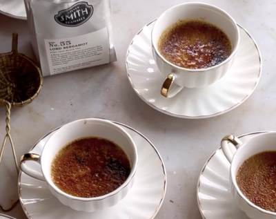 Three Lord Bergamot creme brulees in vintage teacups.
