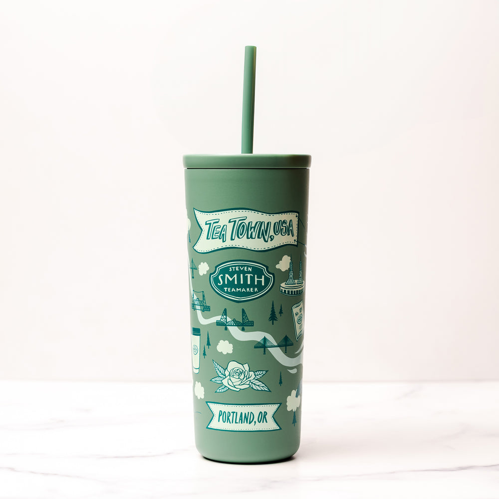 Green tumbler with 'Tea Town USA' branding on a white background