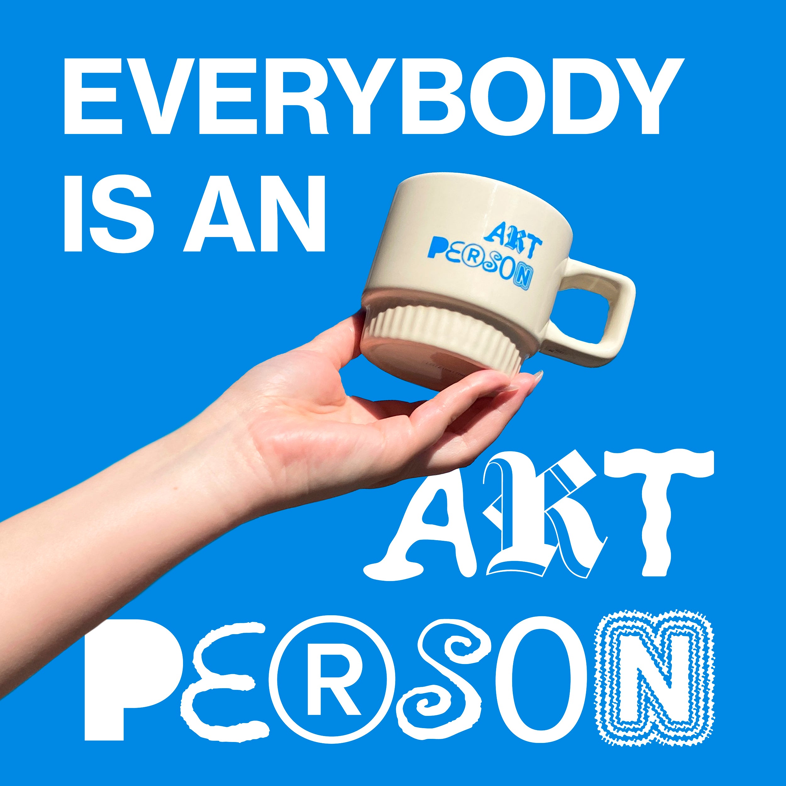 Hand holding a mug with 'ART PERSON' text against a blue background with motivational quote: Everybody is an art person.