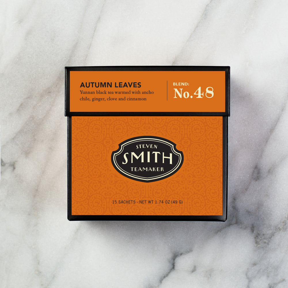 Orange box of Autumn Leaves with Smith logo against a marble background.