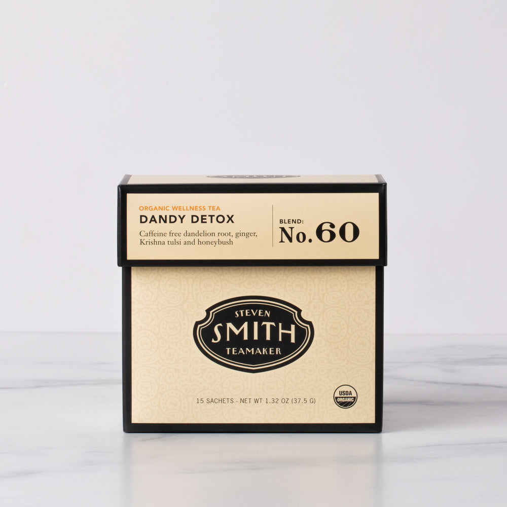 Cream box of Dandy Detox full-leaf wellness tea sachets with Smith shield in center of box.