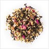 Pile of loose leaf Lover's Leap to show full leaf black tea, chamomile petals and rose petals.