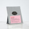 Standard sized grey pouch of loose leaf tea with a pink Lover's Leap label.