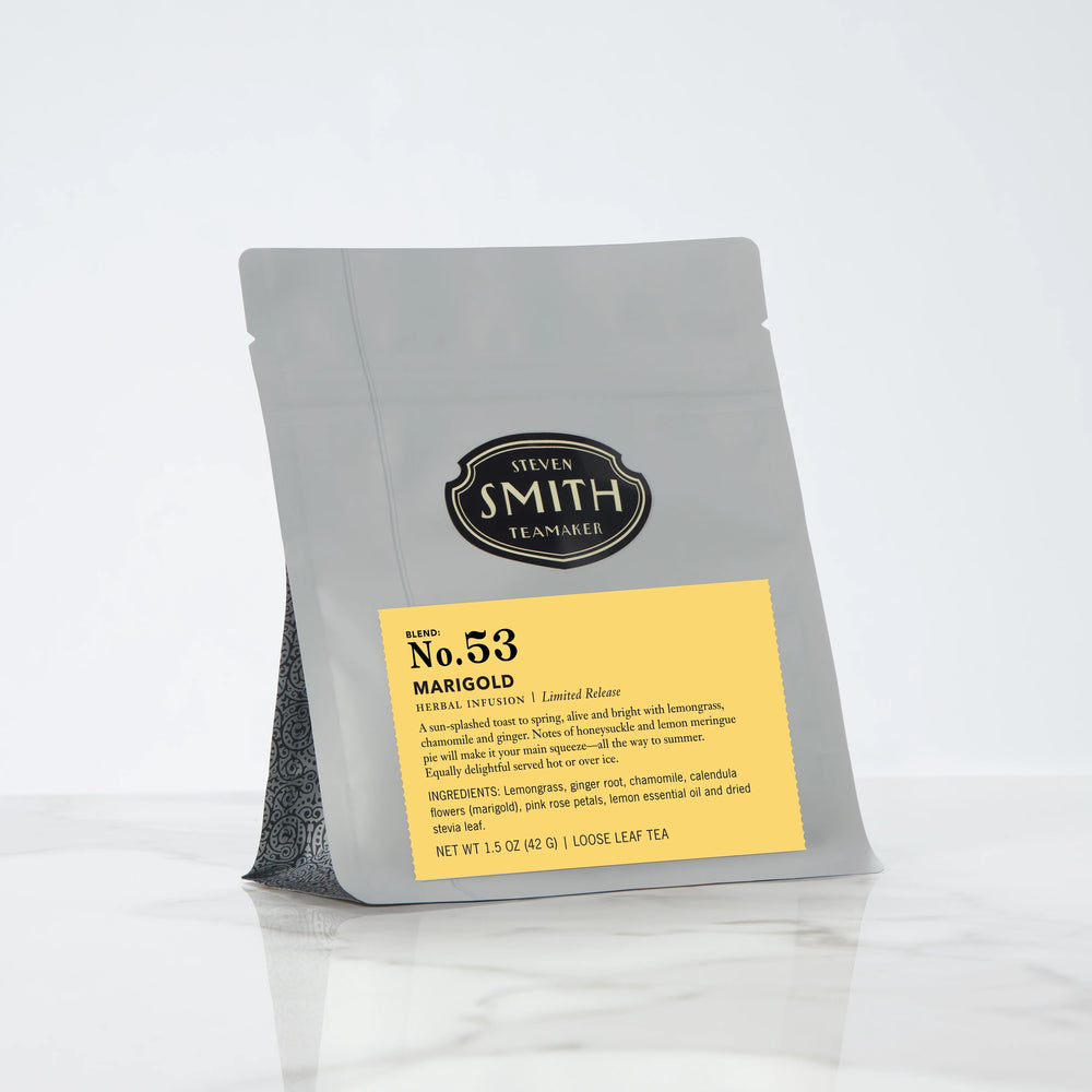 Grey package of Steven Smith Tea with a yellow label on a white background