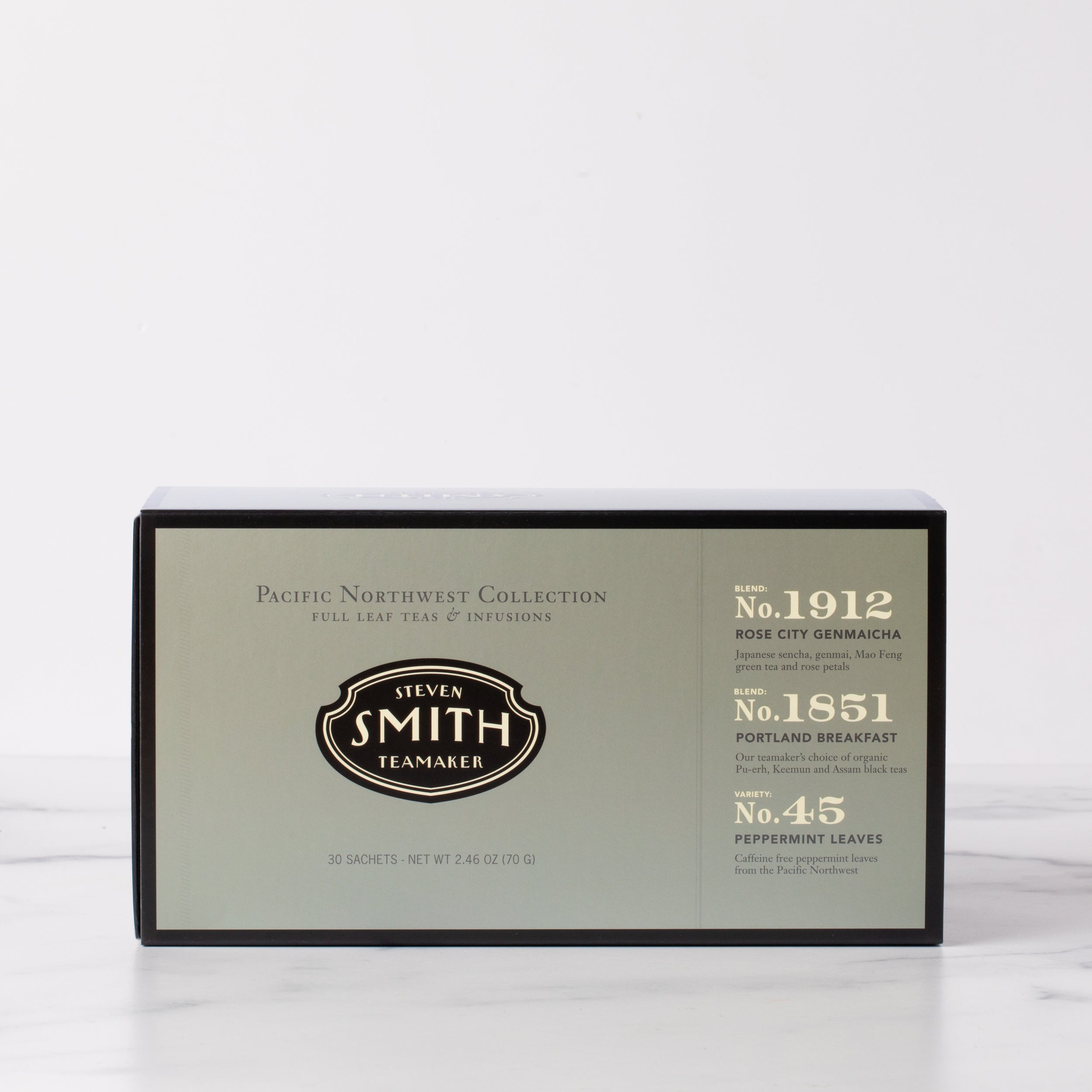 Dark silver box with black trim on marble background.