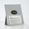 Grey loose leaf bag of Phoenix Oolong with Smith logo.