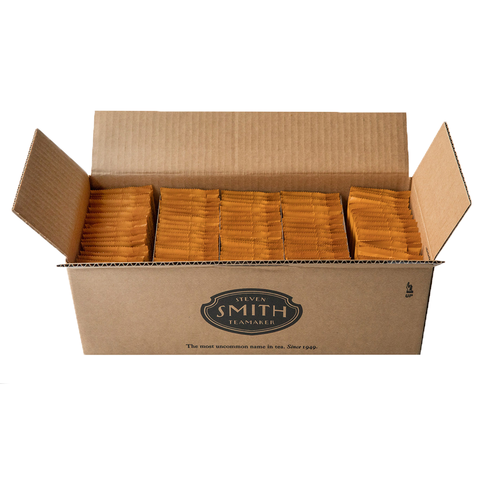 Cardboard box filled with 100 orange sachets featuring the Smith Tea brand logo.