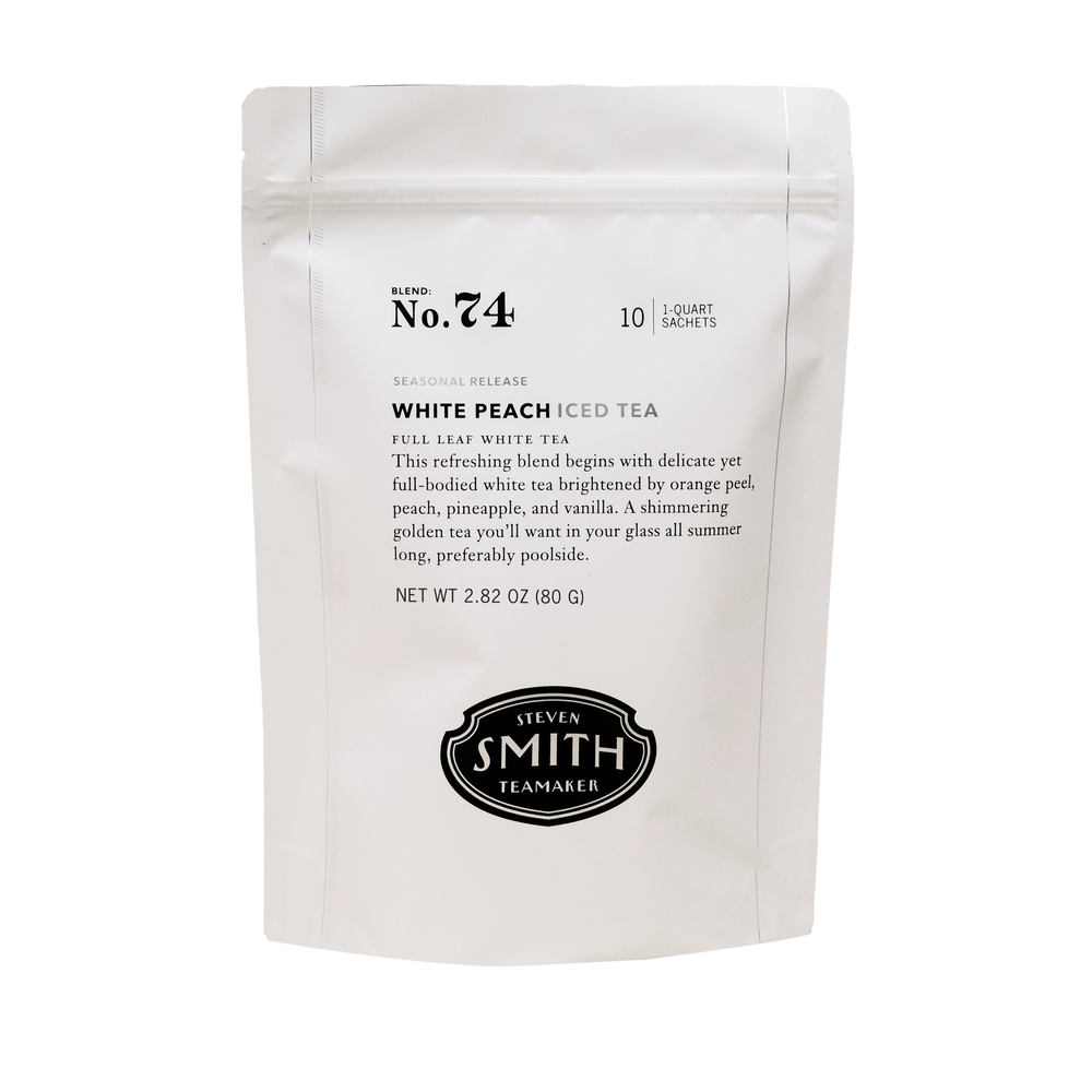 White bag of 10 White Peach sachets on white background