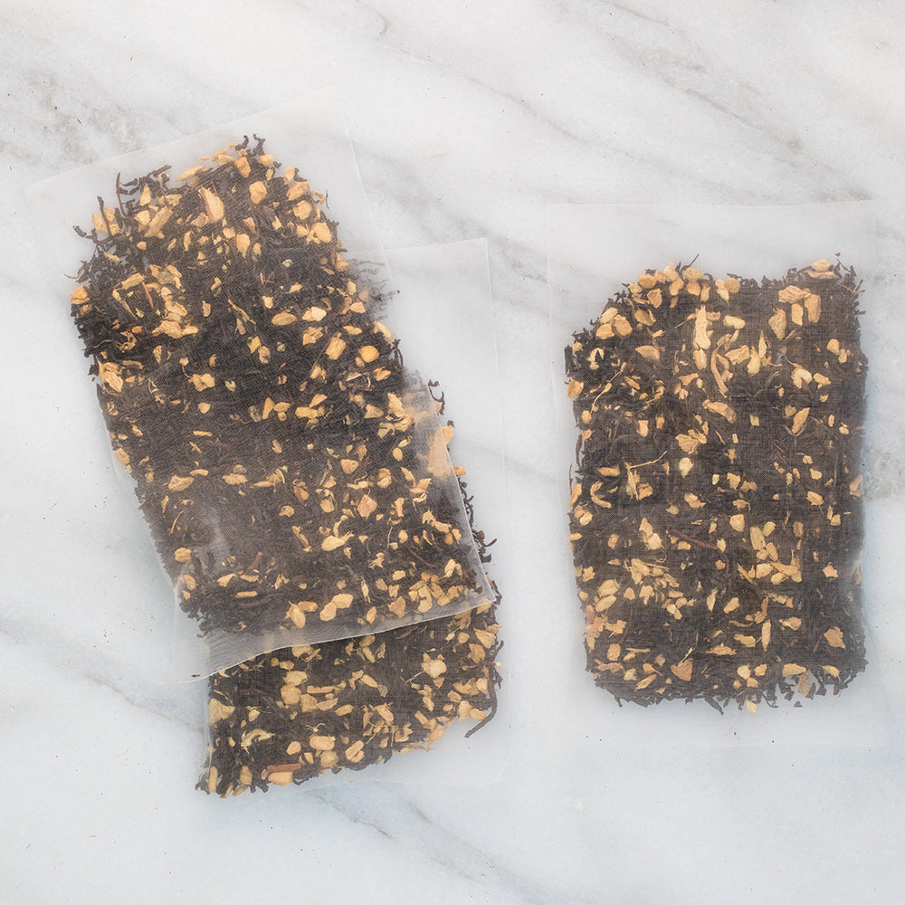 Three oversized sachets of Ginger Peach iced tea.