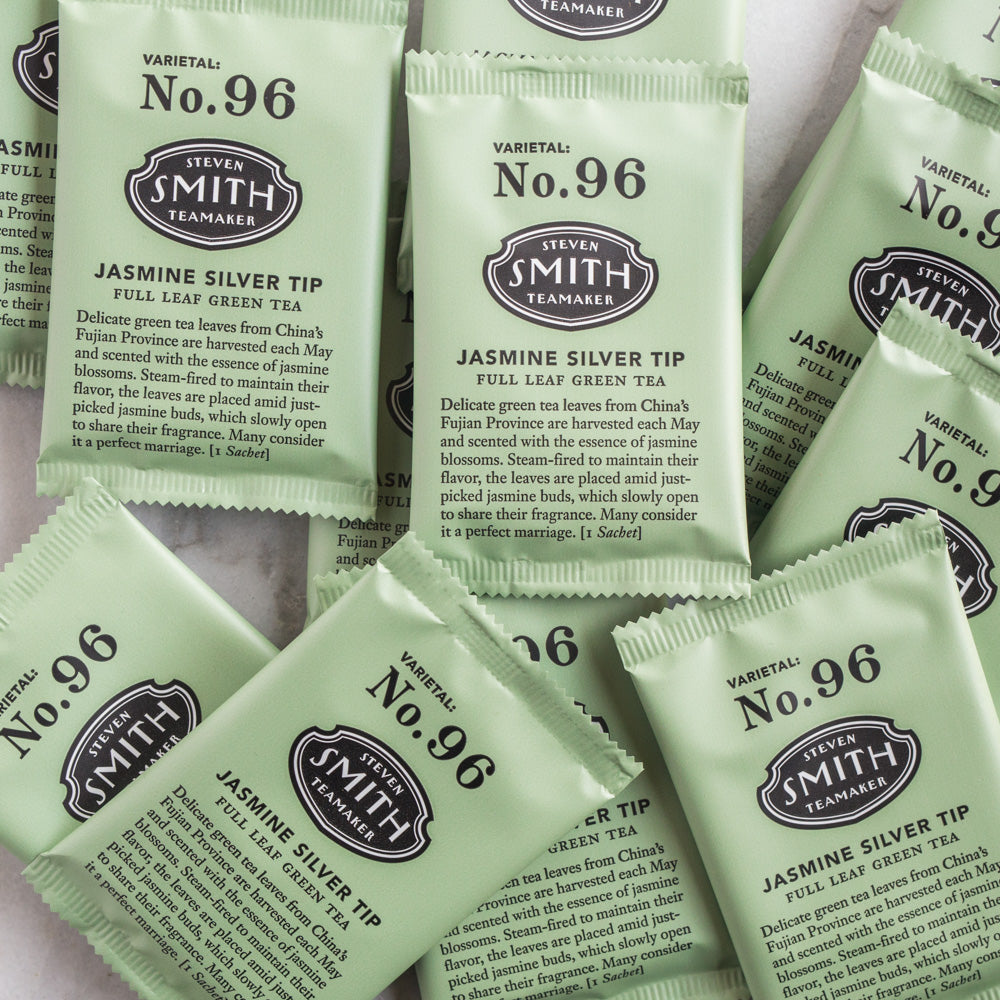 Cardboard box filled with 100 sachets of Jasmine Silver Tip tea.